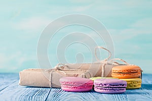 Set of various pastel colored macaroon and gift boxes with ribbon