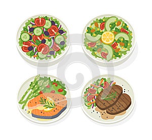 Set of various plates of food with fresh vegetable salad, beef steak, salmon steak.