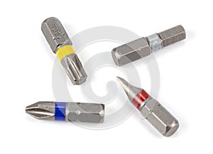 A set of various screwdriver bits on white background