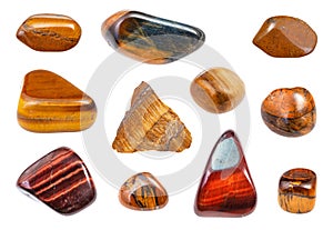 Set of various Tiger`s eye gemstones isolated
