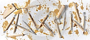 Set of various tools for clay carving on table