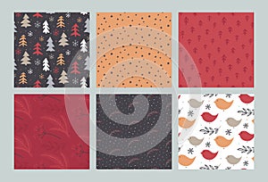 Set of vector Christmas seamless patterns with hand drawn simple elements