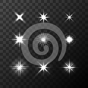 Set of Vector glowing light effect stars bursts on transparent background. Transparent stars