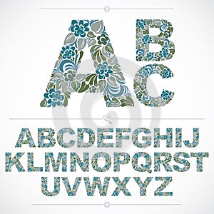 Set of vector ornate capitals, flower-patterned typescript. Colo