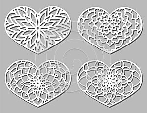 Set of Vector Stencil lacy hearts with carved openwork pattern.