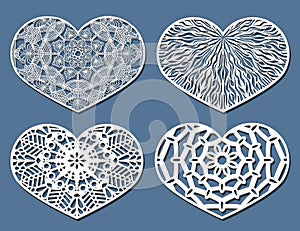 Set of Vector Stencil lacy hearts with carved openwork pattern.