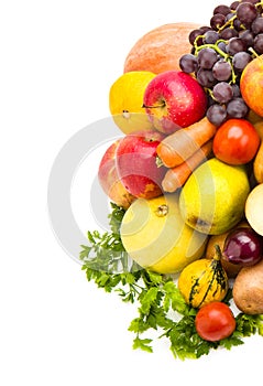 Set of vegetables and fruits isolated on a white. Free space for text.Vertical photo
