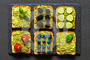 Set of vegetarian toast sandwiches with avocado. Variety of healthy food