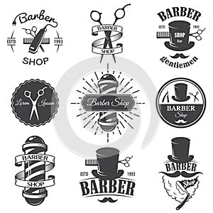 Set of vintage barber shop emblems