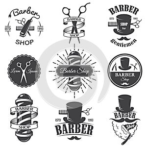 Un conjunto compuesto por antiguo Barbero la tienda emblemas 