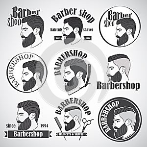 Set of vintage barber shop emblems, label, badges and designed elements