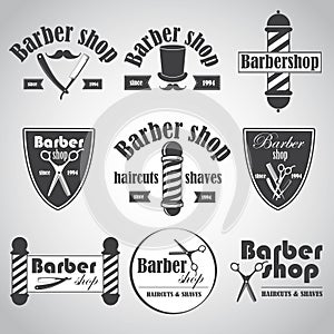 Set of vintage barber shop emblems, label, badges and designed elements