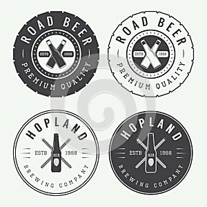 Set of vintage beer and pub logos, labels and emblems with bottles