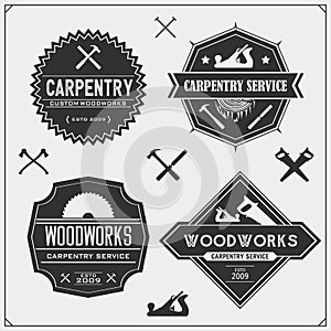 Set of vintage carpentry emblems. Woodwork  labels, badges, logos and design elements.