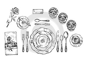 Set of vintage dishes, glasses and cutlery