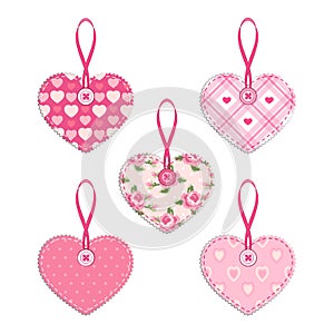 Set of vintage fabric handmade hearts with ribbon and button in shabby chic style