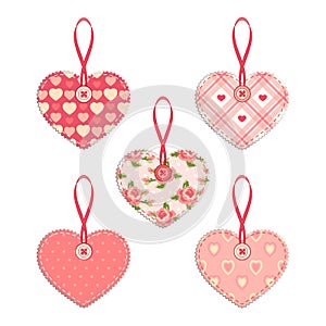 Set of vintage fabric handmade hearts with ribbon and button in shabby chic style