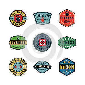 Set of vintage fitness gym logos. vector illustration