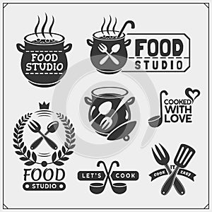 Set of vintage food studio emblems, labels and design elements. Cooking class, cooking courses, culinary school logos.