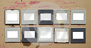 Set of vintage grungy photographic slides, empty frames, free space for pics