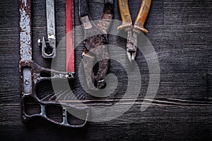 Set of vintage handsaw wire-cutter pliers construction concept