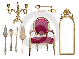 Set of 9 vintage items isolated on white background. Red chair, mirror frame, candelabrum, cutlery, spoons, forks, cake shovels