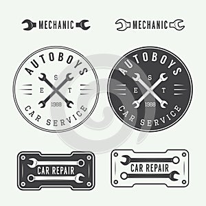 Set of vintage mechanic labels, emblems and logo. Vector illustration
