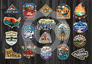 Set of Vintage Outdoor Summer Camp Logo Patches on Wood board. Hand drawn and vector emblem designs. Great for shirts, stamps, sti