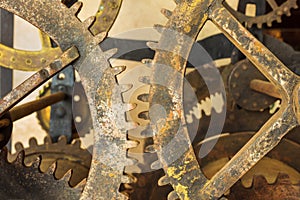 Set of vintage rusted gearwheels photo