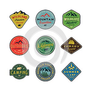 Set of vintage wilderness logos. hand drawn retro styled outdoor adventure emblems. vector illustration