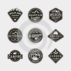 Set of vintage wilderness logos. hand drawn retro styled outdoor adventure emblems. vector illustration