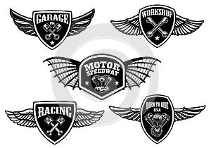 Set of vintage winged emblems. Racing, motorcycles, repair workshop. Design element for logo, label, sign, poster, t shirt.