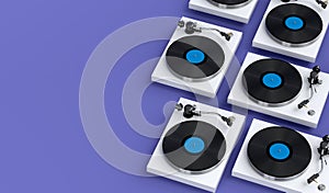 Set of vinyl record player or DJ turntable with retro vinyl disk on violet
