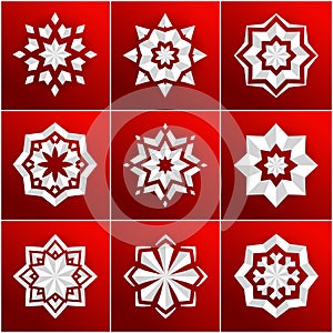 Set of volumetric white snowflake on a red background. Christmas star. Mandala.