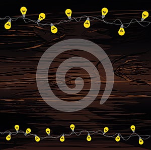 A set of warm light bulb garlands, holiday decorations. The lamps. Glowing Christmas lights. Vector on wooden background