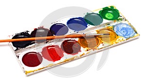 Set of water-colour paints and brush