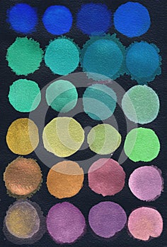 Set of watercolor circles of blue, green, red, brown, mustard, mint colors isolated on black background