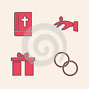 Set Wedding rings, Holy bible book, on hand and Gift box icon. Vector