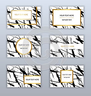 Set of white, black and gold business cards templates.