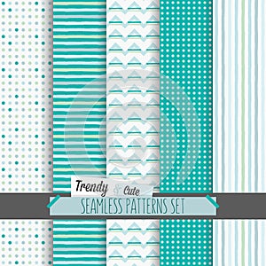 Set of white and blue dotted, stripes and chevron seamless patterns