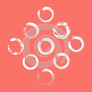 set of white circle brush strokes for frames, icons, design elements on living coral color trend 2019 background