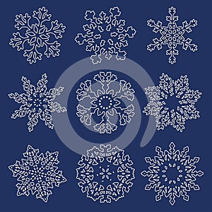 Set of white linear snowflakes