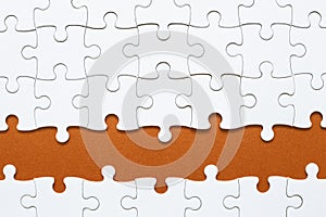 Set of white puzzle pieces and red blank copy space