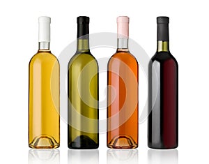 Set of white, rose, and red wine bottles.