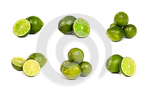 Set of whole limes and half limes on a white