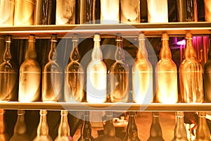 Set of wine bottles in the fashion city cafe with nobody