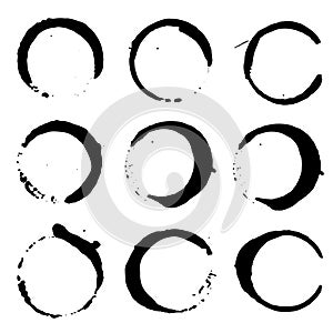 Set of wine or coffee stains. Set of black ink splashes and drops made with brush. Grunge paint circle vector element