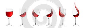 Set of wine glasses with splashes of wine isolated on white back