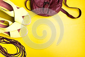 Set of Woman's Things Accessories to Summer Season. Brown Bag Yellow Platform Sandals, Necklace. Flat Lay.