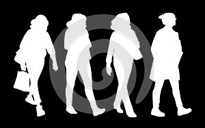 Set of women taking a walk. Concept. Monochrome vector illustration of silhouettes of women walking in different poses